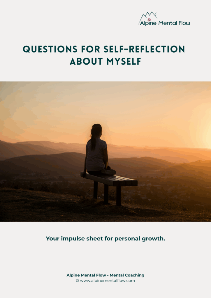 A woman sits on a bench at sunset in the mountains 